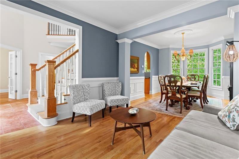 1169 Dawn View Lane Northwest Atlanta, GA 30327 - Photo 8 of 61 a living room with furniture and floor to ceiling windows
