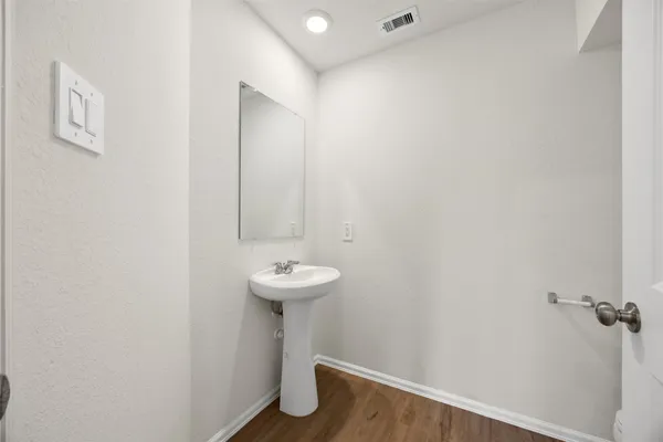 a view of a room with racks on the wall