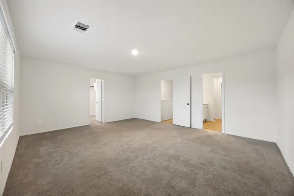 an aerial view of a house with outdoor space