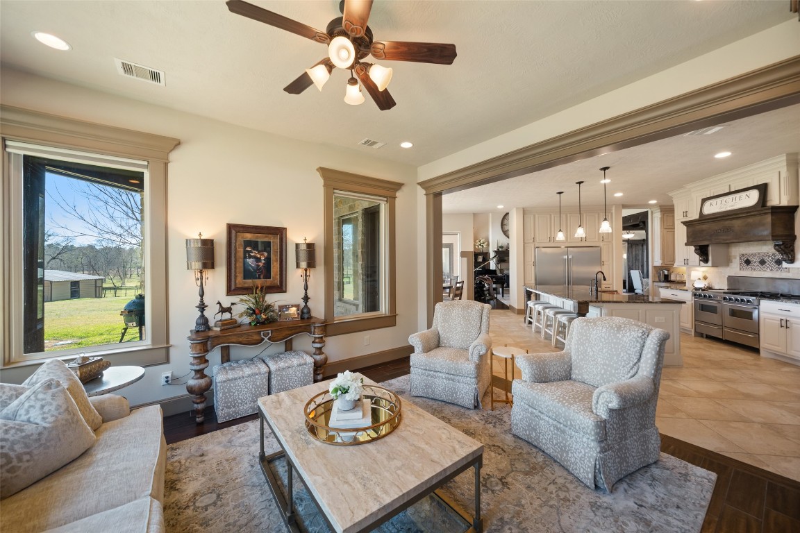 40 Stewart Road New Waverly, TX 77358 - Photo 15 of 50 a living room with furniture and a large window