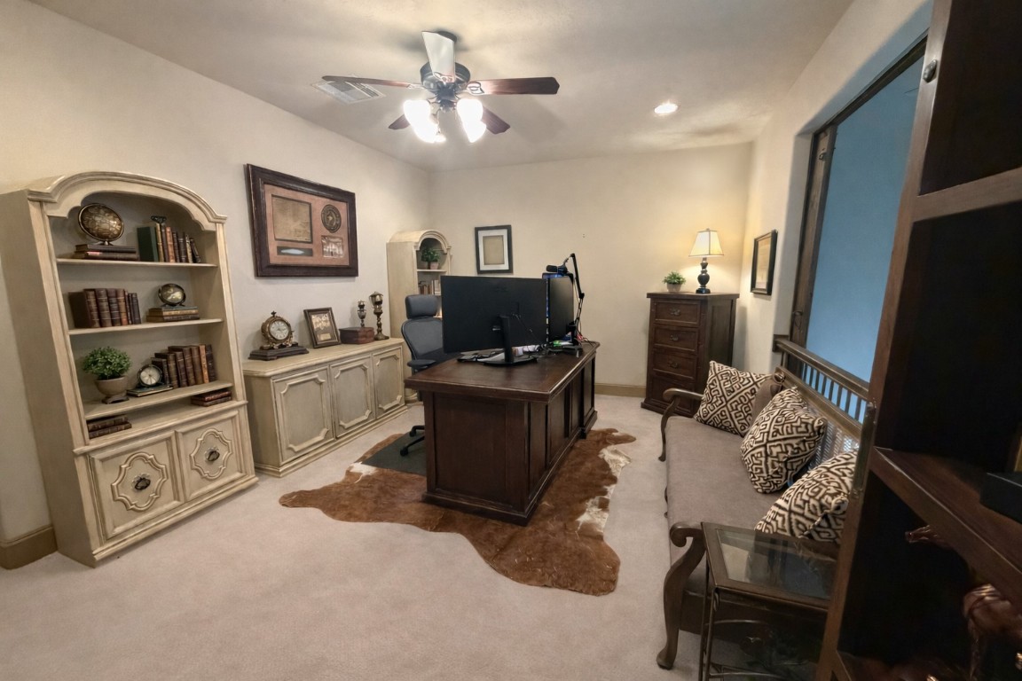 40 Stewart Road New Waverly, TX 77358 - Photo 22 of 50 a living room with furniture and a flat screen tv