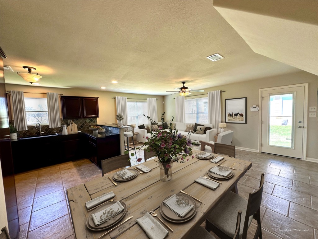 40 Stewart Road New Waverly, TX 77358 - Photo 32 of 50 a living room with furniture and a flat screen tv
