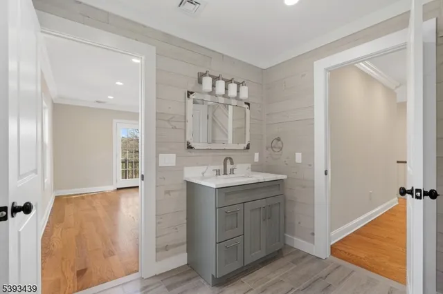 a view of a bathroom from the hallway