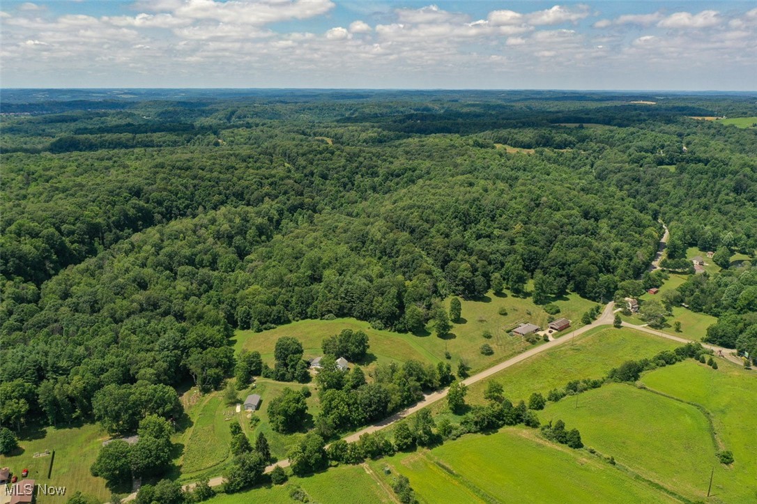 1728 Tall Timber Road Northeast New Philadelphia, OH 44663 - Photo 13 of 39 Aerial view of a heavily wooded area