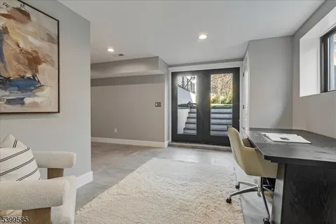 a workspace with furniture and window