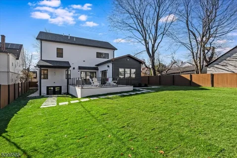a view of a house with a big yard