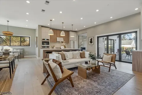 a living room with furniture and a table