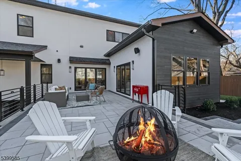 a view of living room kitchen and dining area