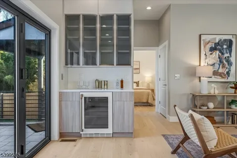 a kitchen with a table and chairs