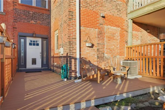 a view of a balcony with dining area