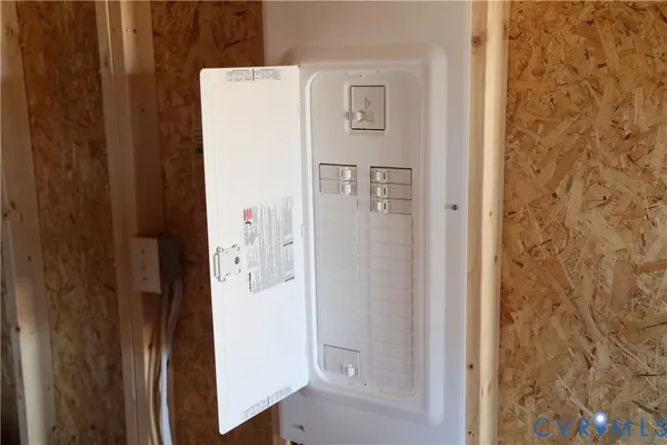a white refrigerator freezer and a granite counter tops