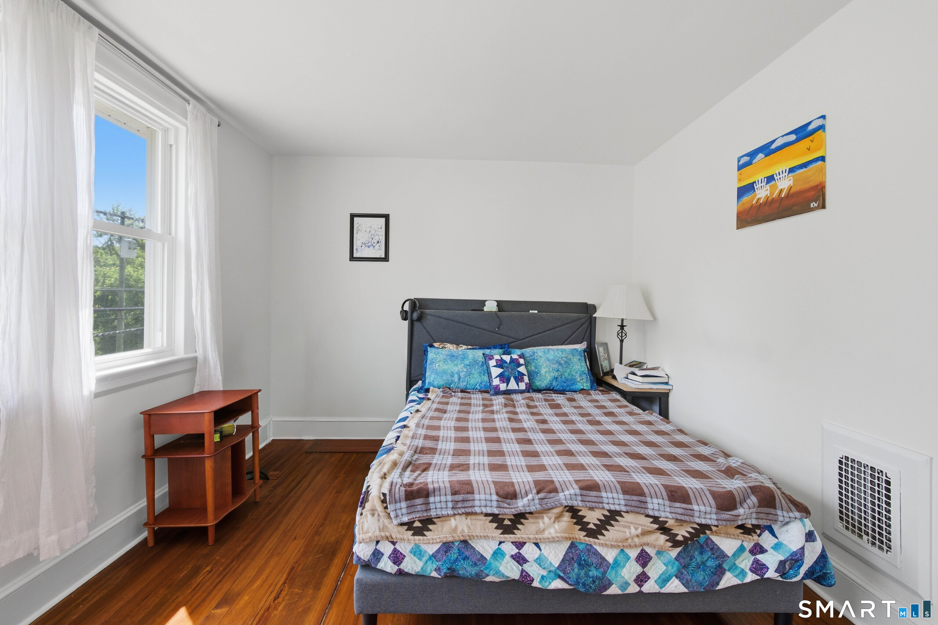 120 May Street Naugatuck, CT 06770 - Photo 20 of 31 a bedroom with a bed and wooden floor