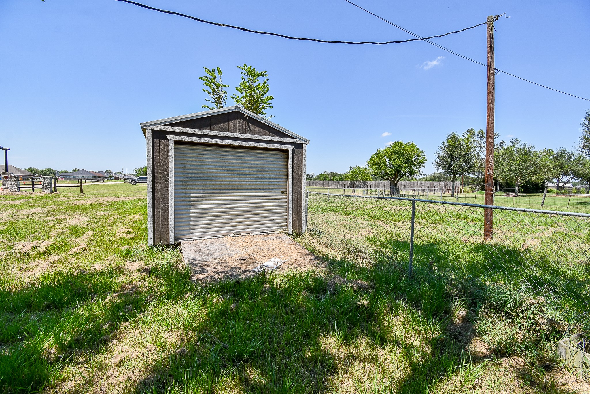 14235 Buffalo Street Needville, TX 77461 - Photo 20 of 21 a house view with a outdoor space