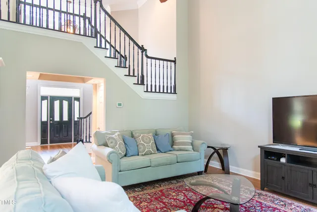 a living room with furniture or stairs and a couch