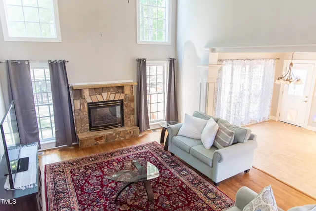 a living room with a fireplace