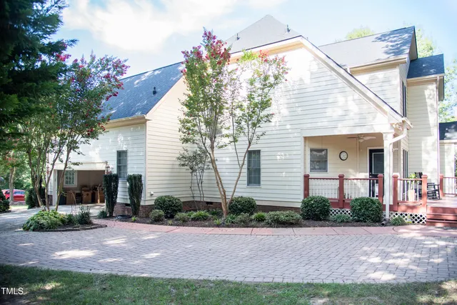 a backyard of a house with entertaining space