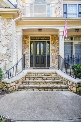 a view of a house with a window and stairs