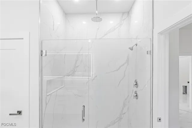 a bathroom with a double vanity sink mirror and