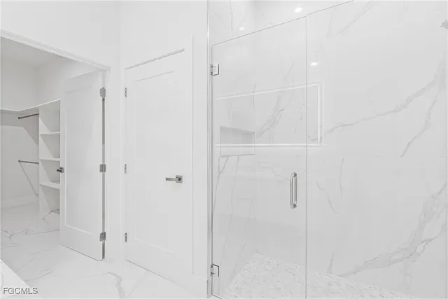 a view of an empty walk in closet