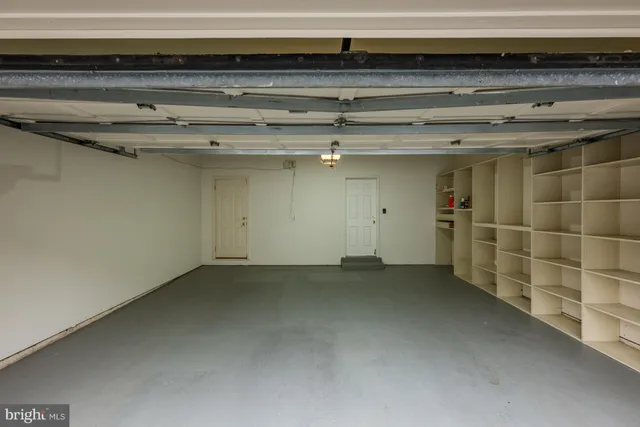 a view of a refrigerator in a kitchen