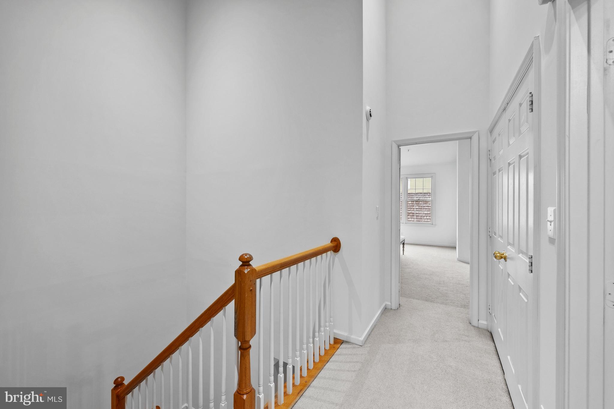 313 Hart Road Gaithersburg, MD 20878 - Photo 19 of 33 a view of a hallway with wooden floor and entryway