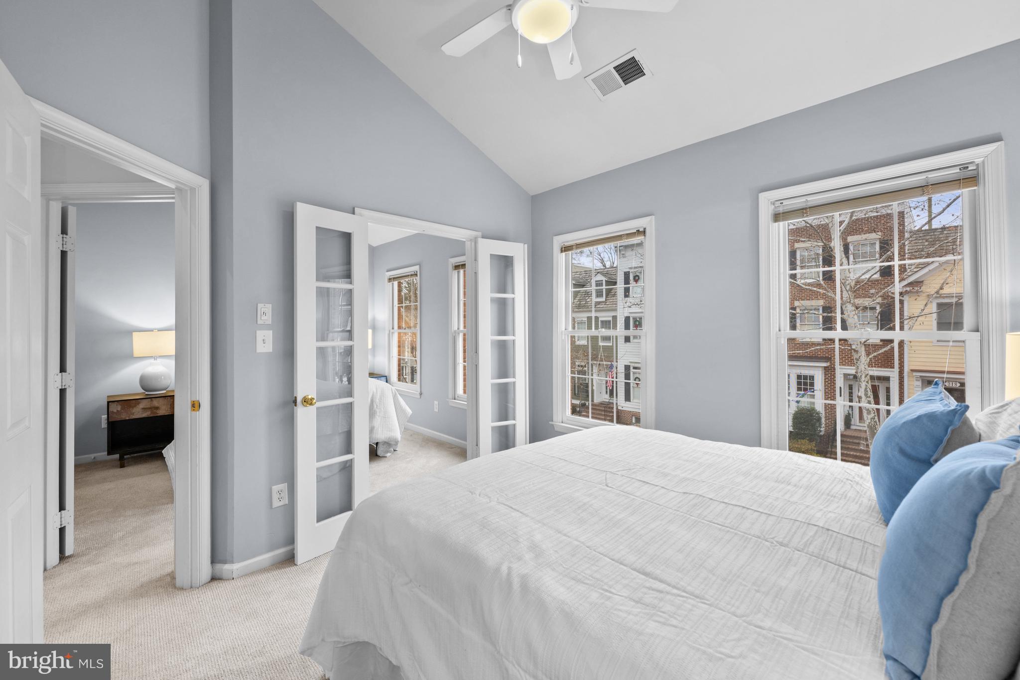 313 Hart Road Gaithersburg, MD 20878 - Photo 25 of 33 a bedroom with a large bed and a large window