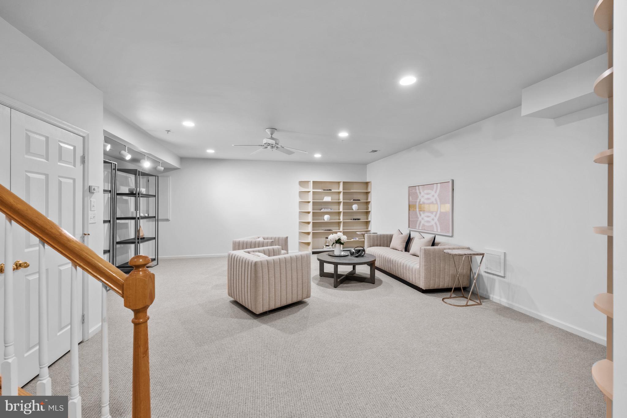 313 Hart Road Gaithersburg, MD 20878 - Photo 29 of 33 a living room with furniture and a wooden floor
