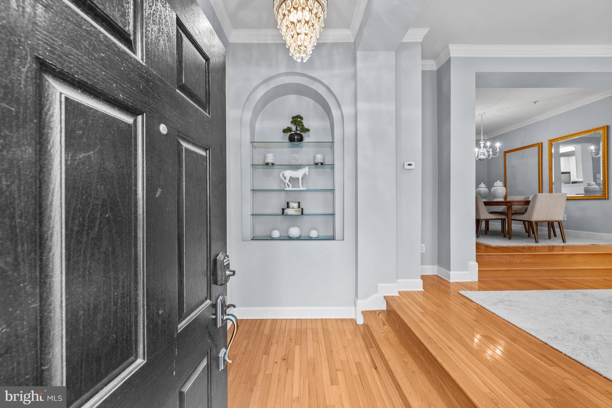 313 Hart Road Gaithersburg, MD 20878 - Photo 3 of 33 a view of entryway with wooden floor