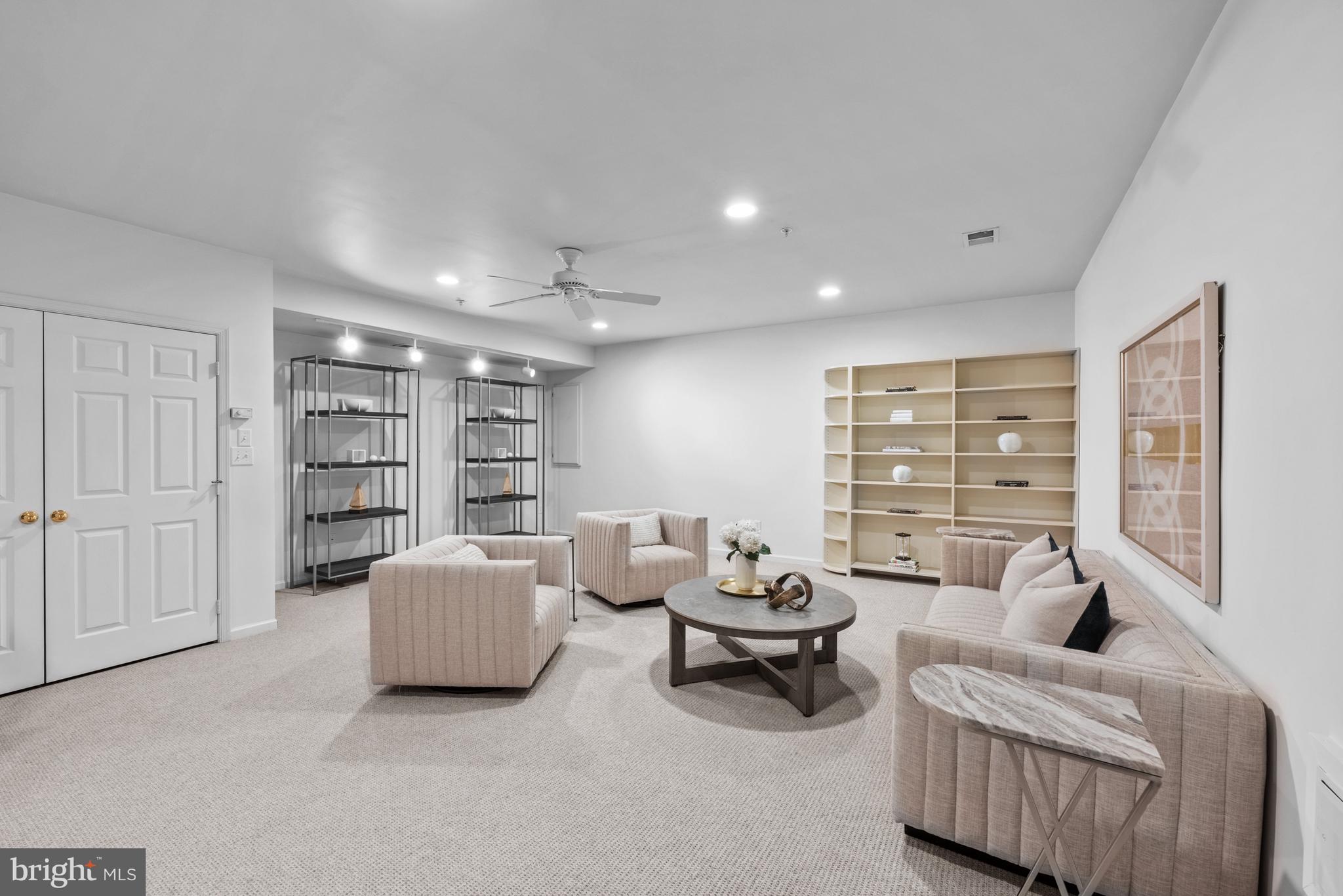 313 Hart Road Gaithersburg, MD 20878 - Photo 31 of 33 a living room with furniture and a large window