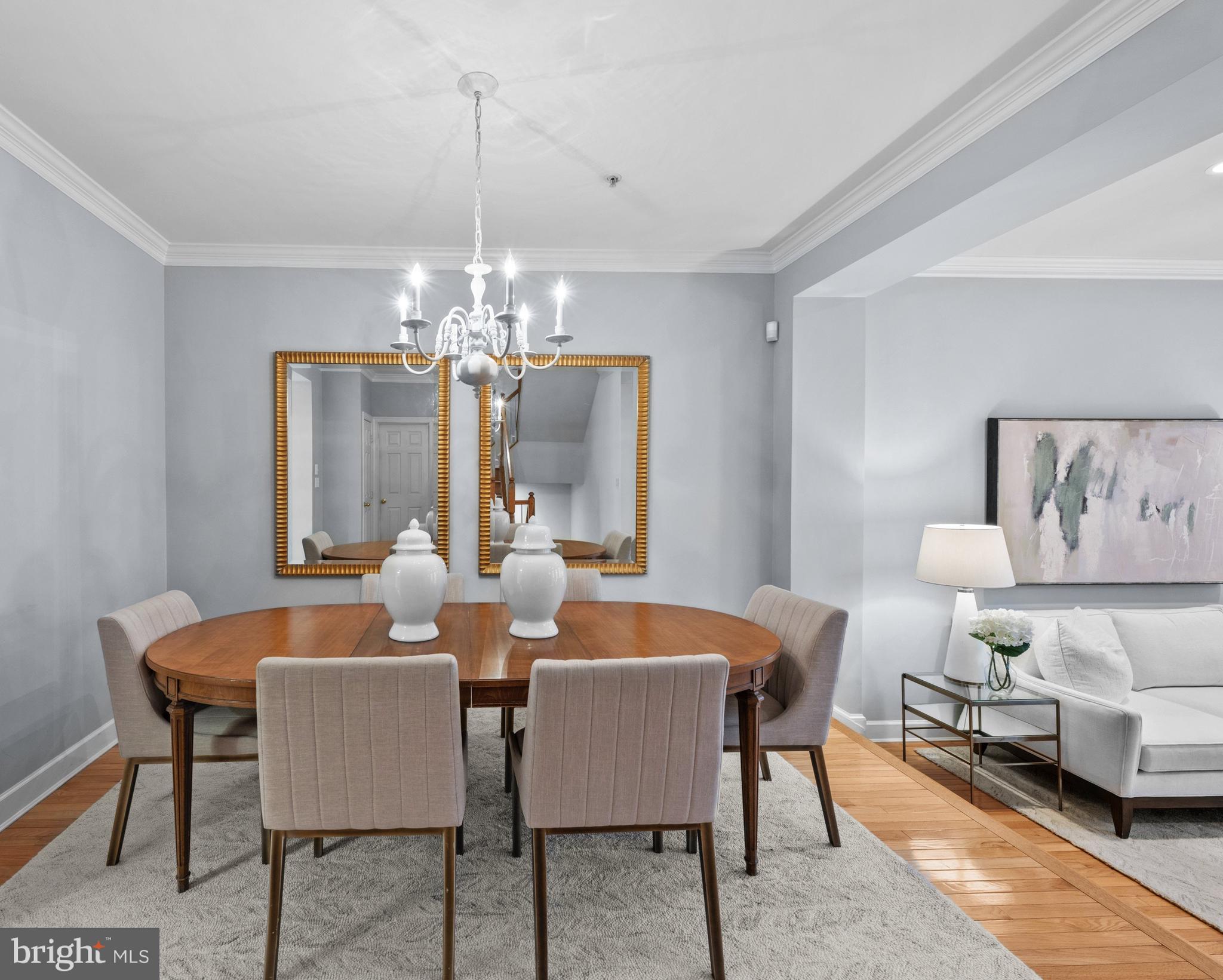 313 Hart Road Gaithersburg, MD 20878 - Photo 7 of 33 a view of a dining room with furniture and chandelier