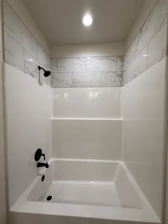 a bathroom with a tub