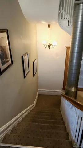 a room with furniture and air hockey table