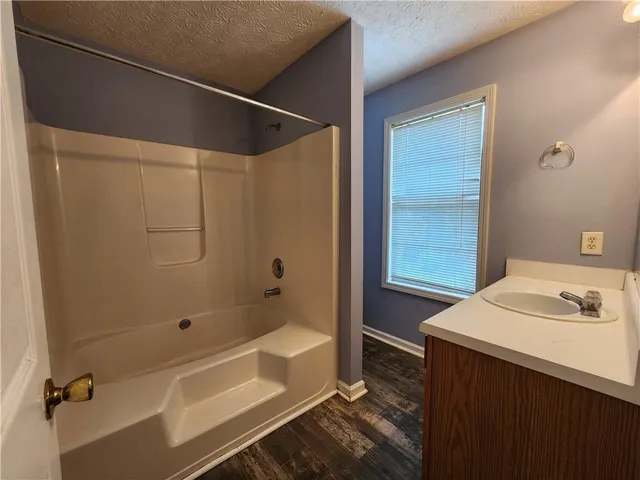 a bathroom with a sink and a tub