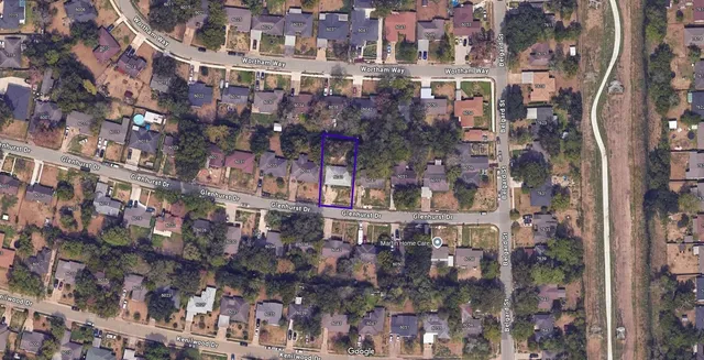 a view of a city with tall buildings