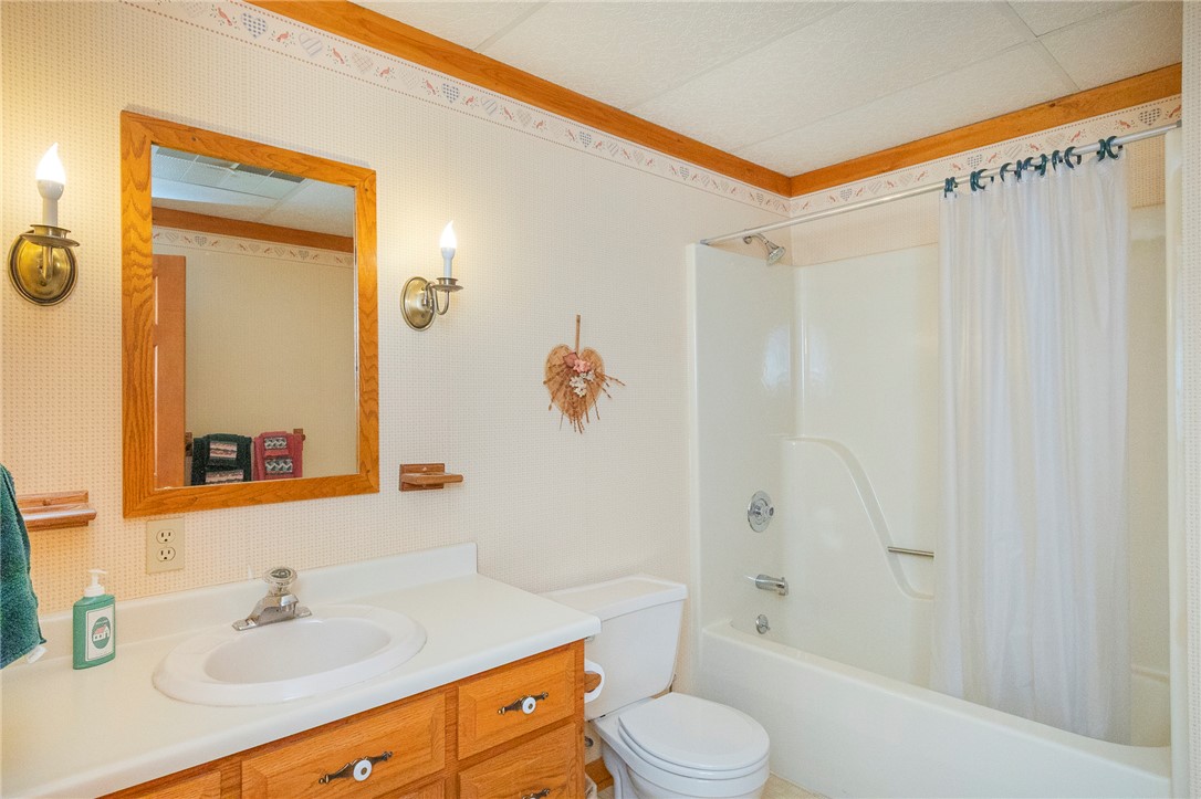 911 State Rd S-4-203 Belton, SC 29627 - Photo 33 of 49 A functional bathroom provides essential amenities for daily routines.