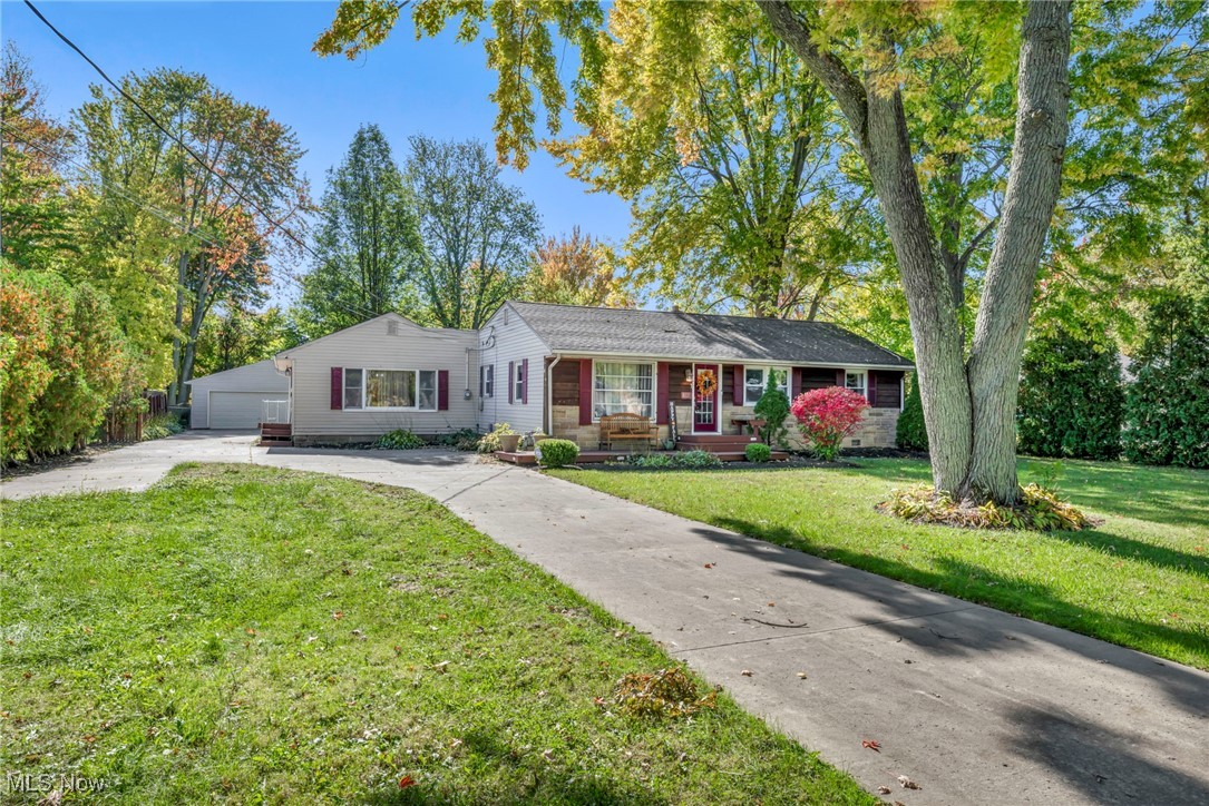 8164 Edgewood Road Mentor, OH 44060 - Photo 5 of 42 Ranch-style house featuring a front lawn and a garage