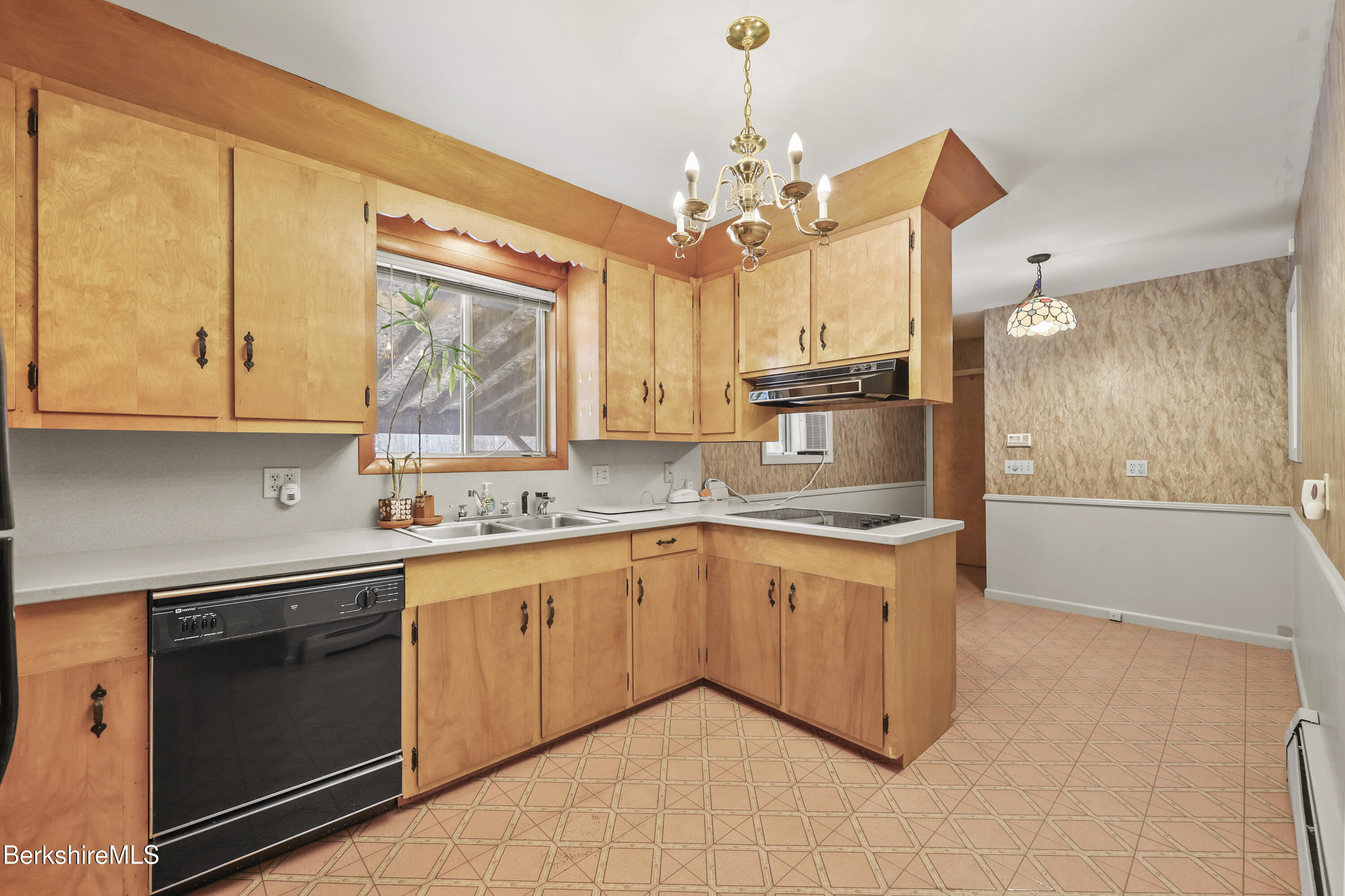 89 Delancy Avenue Pittsfield, MA 01201 - Photo 11 of 40 a kitchen with stainless steel appliances granite countertop a stove and a sink