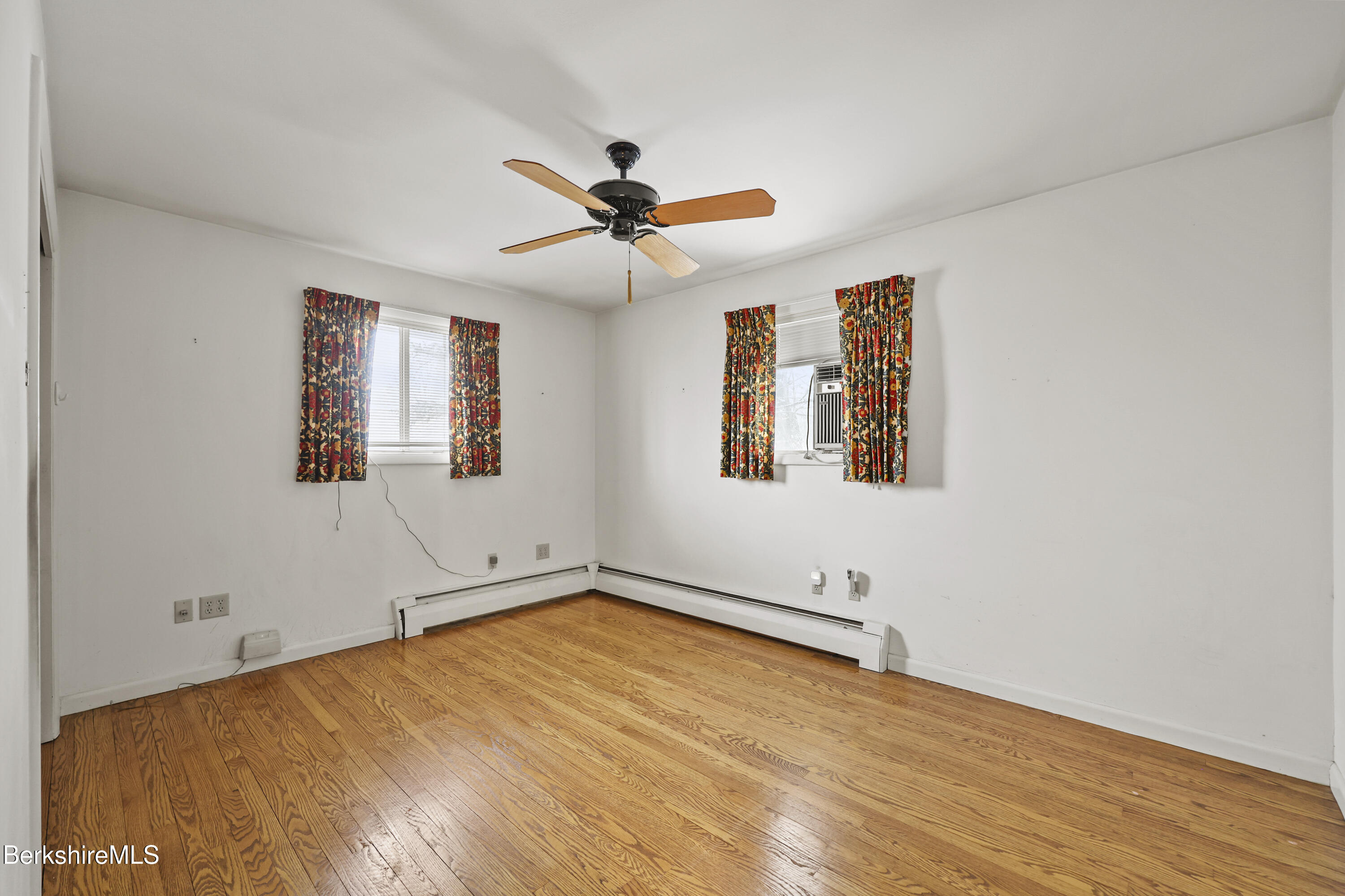 89 Delancy Avenue Pittsfield, MA 01201 - Photo 14 of 40 a view of an empty room with a window
