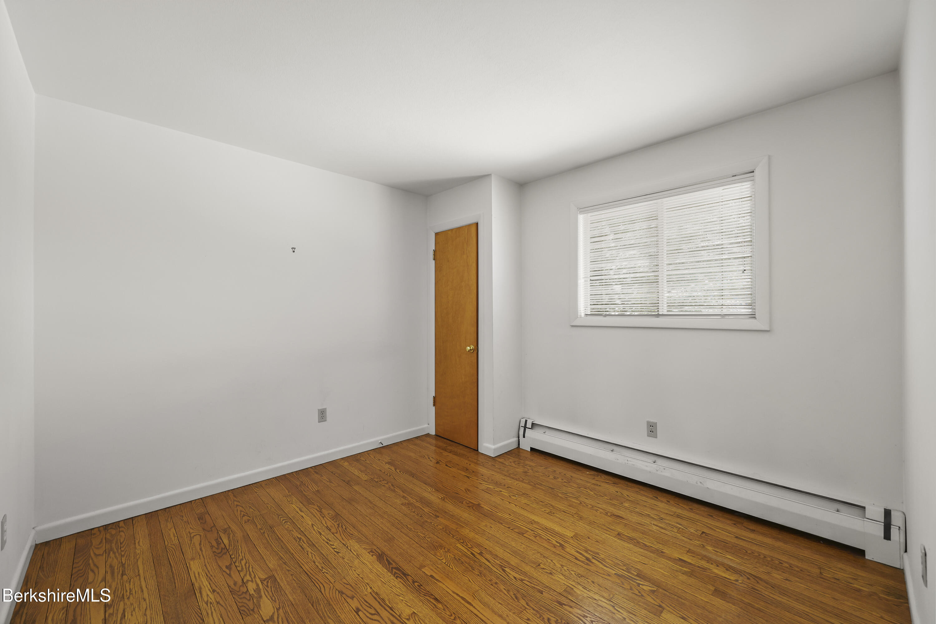 89 Delancy Avenue Pittsfield, MA 01201 - Photo 18 of 40 an empty room with a window