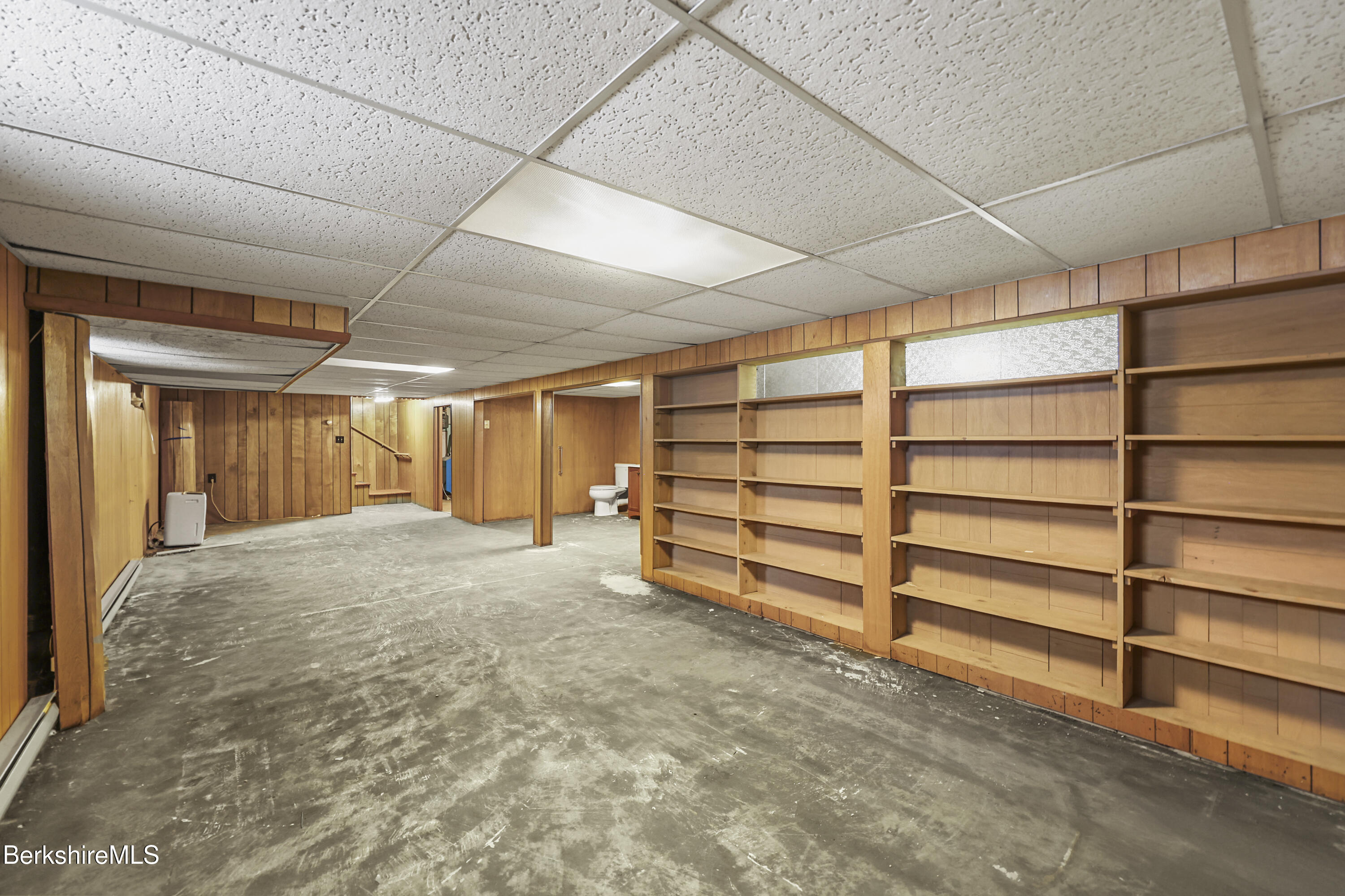 89 Delancy Avenue Pittsfield, MA 01201 - Photo 27 of 40 a view of an empty room with a garage