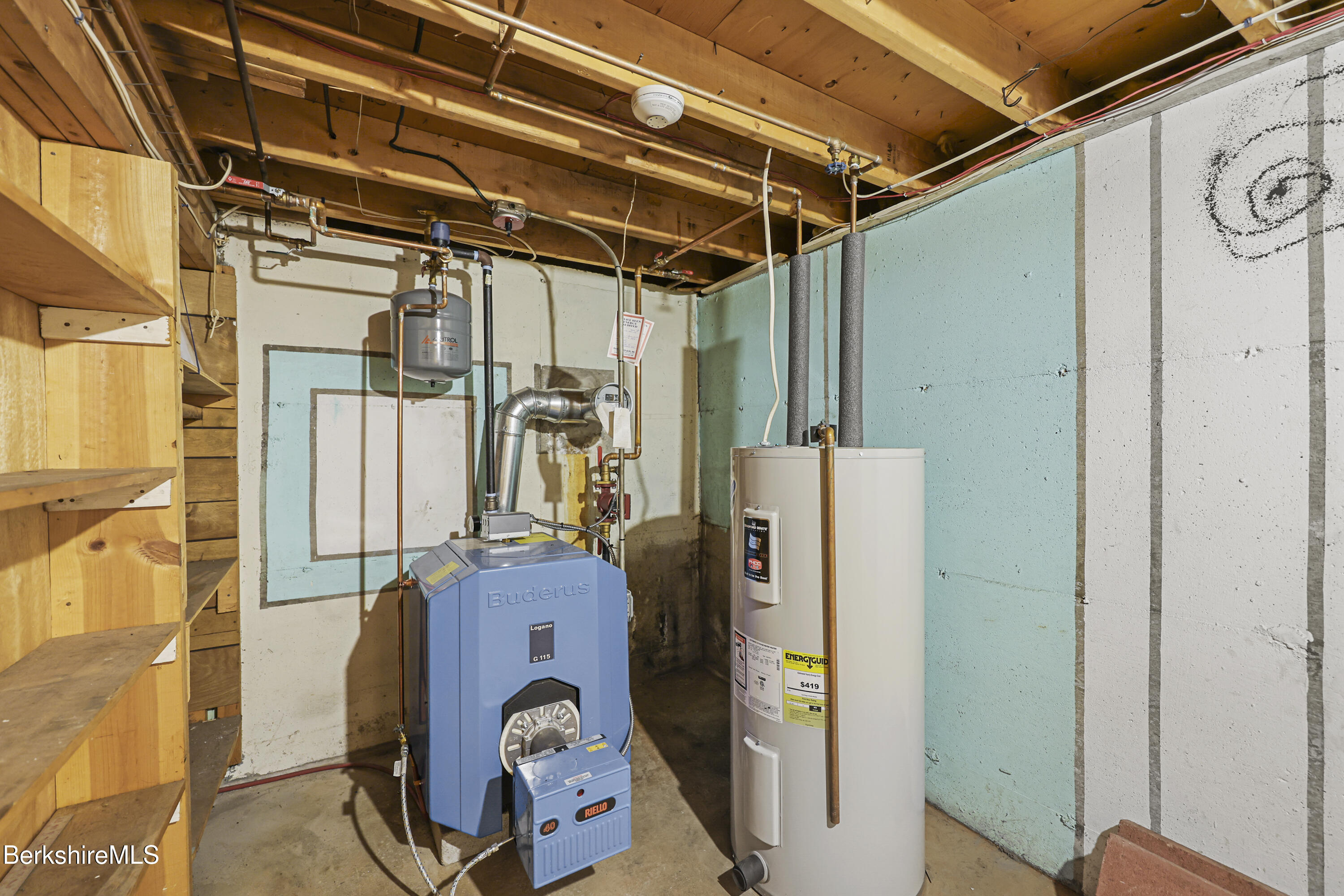 89 Delancy Avenue Pittsfield, MA 01201 - Photo 31 of 40 a utility room with closet and mirror