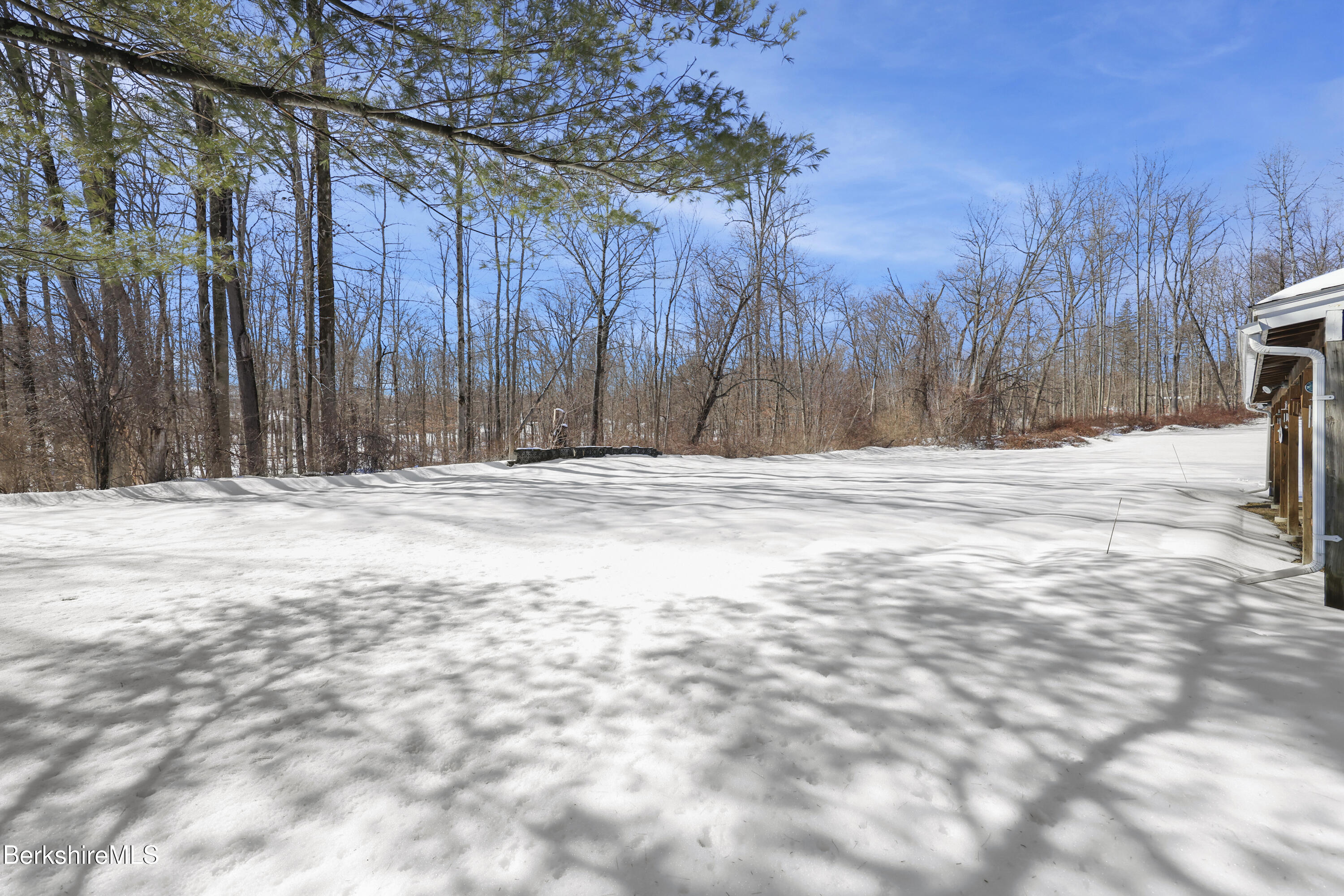 89 Delancy Avenue Pittsfield, MA 01201 - Photo 36 of 40 a view of wooden fence under a large tree