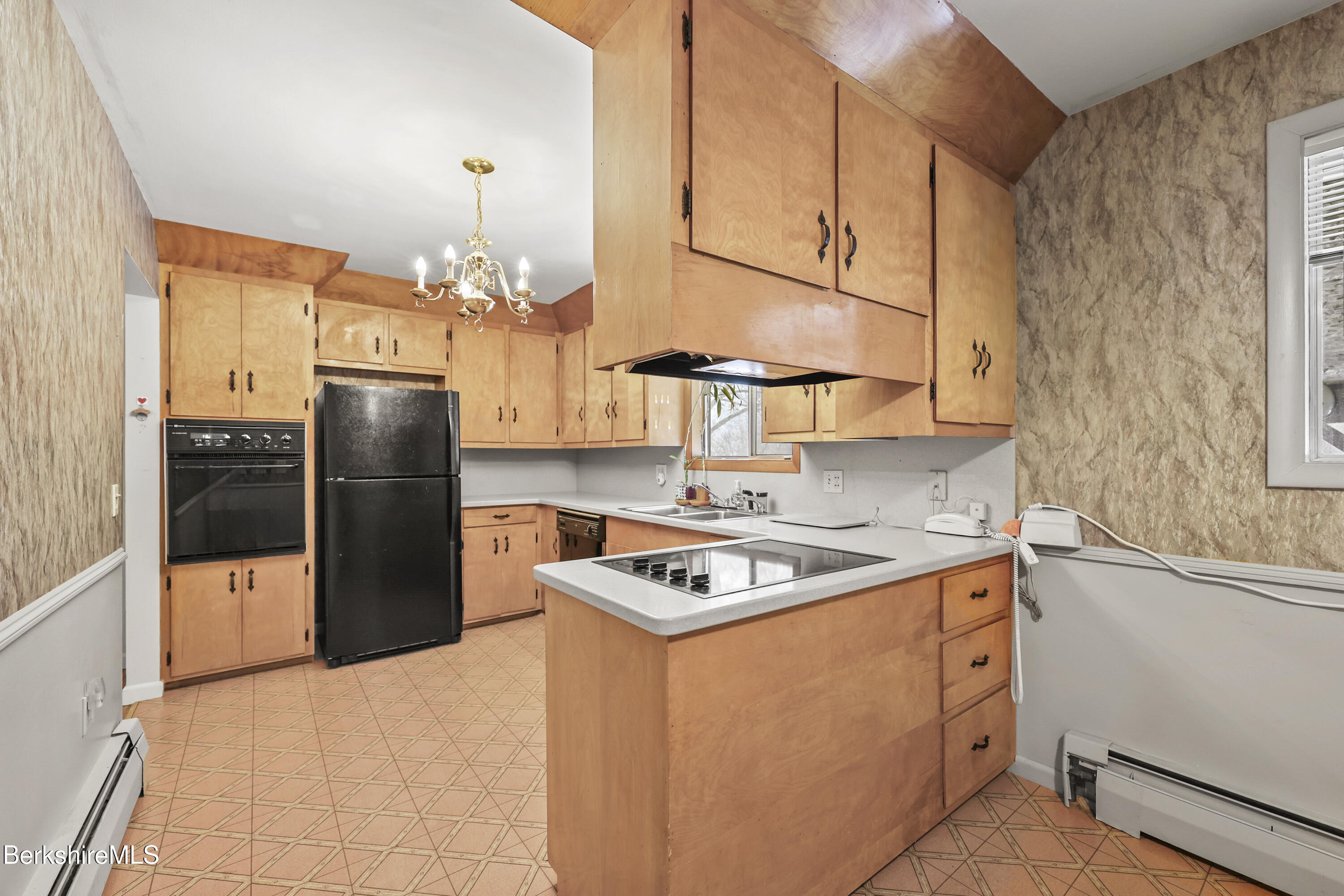 89 Delancy Avenue Pittsfield, MA 01201 - Photo 9 of 40 a kitchen with stainless steel appliances granite countertop a sink stove and refrigerator