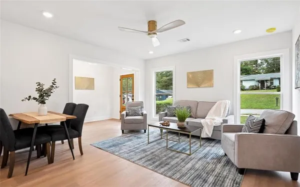 a living room with furniture and a window