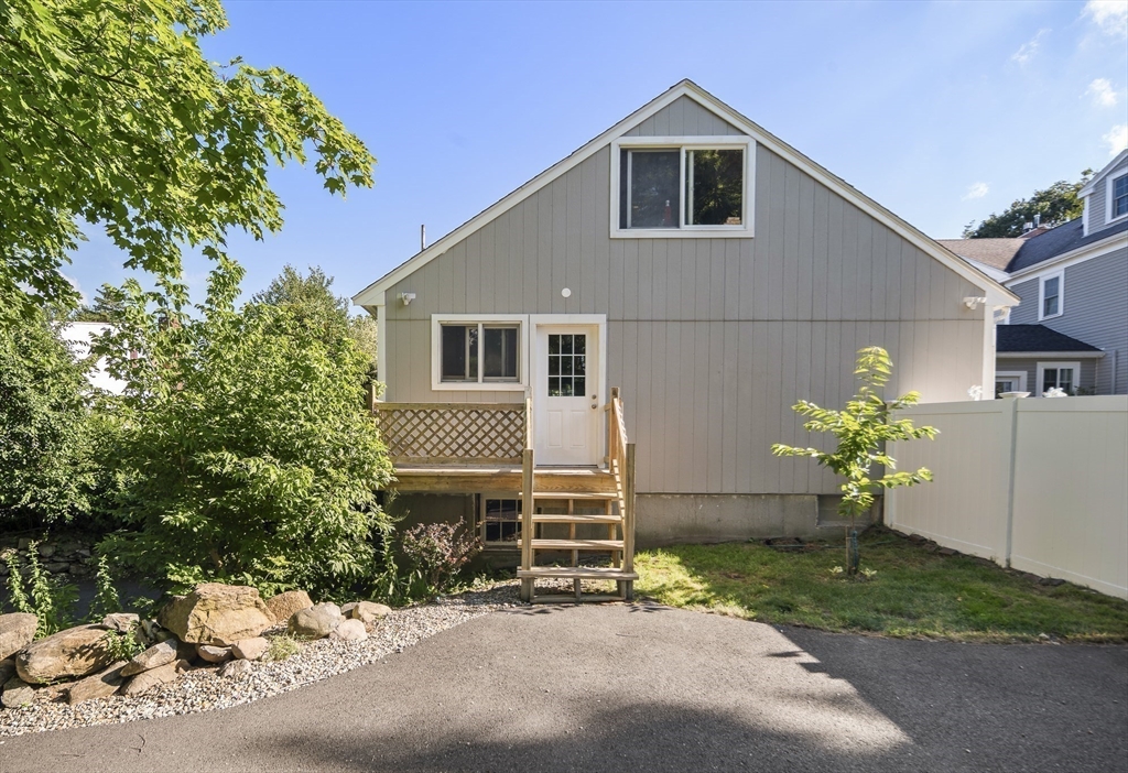 191 Centre Street Danvers, MA 01923 - Photo 39 of 40 a front view of a house with a yard