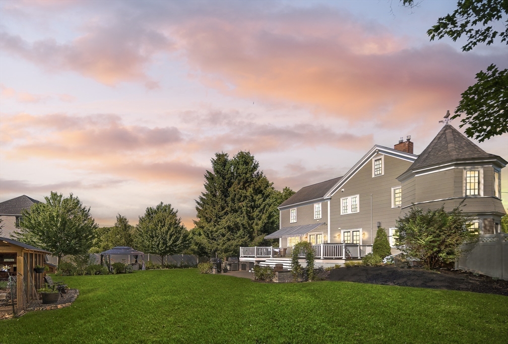 191 Centre Street Danvers, MA 01923 - Photo 40 of 40 a front view of a house with a garden and yard