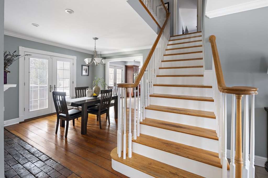 191 Centre Street Danvers, MA 01923 - Photo 7 of 40 a view of a dining room with furniture and wooden floor