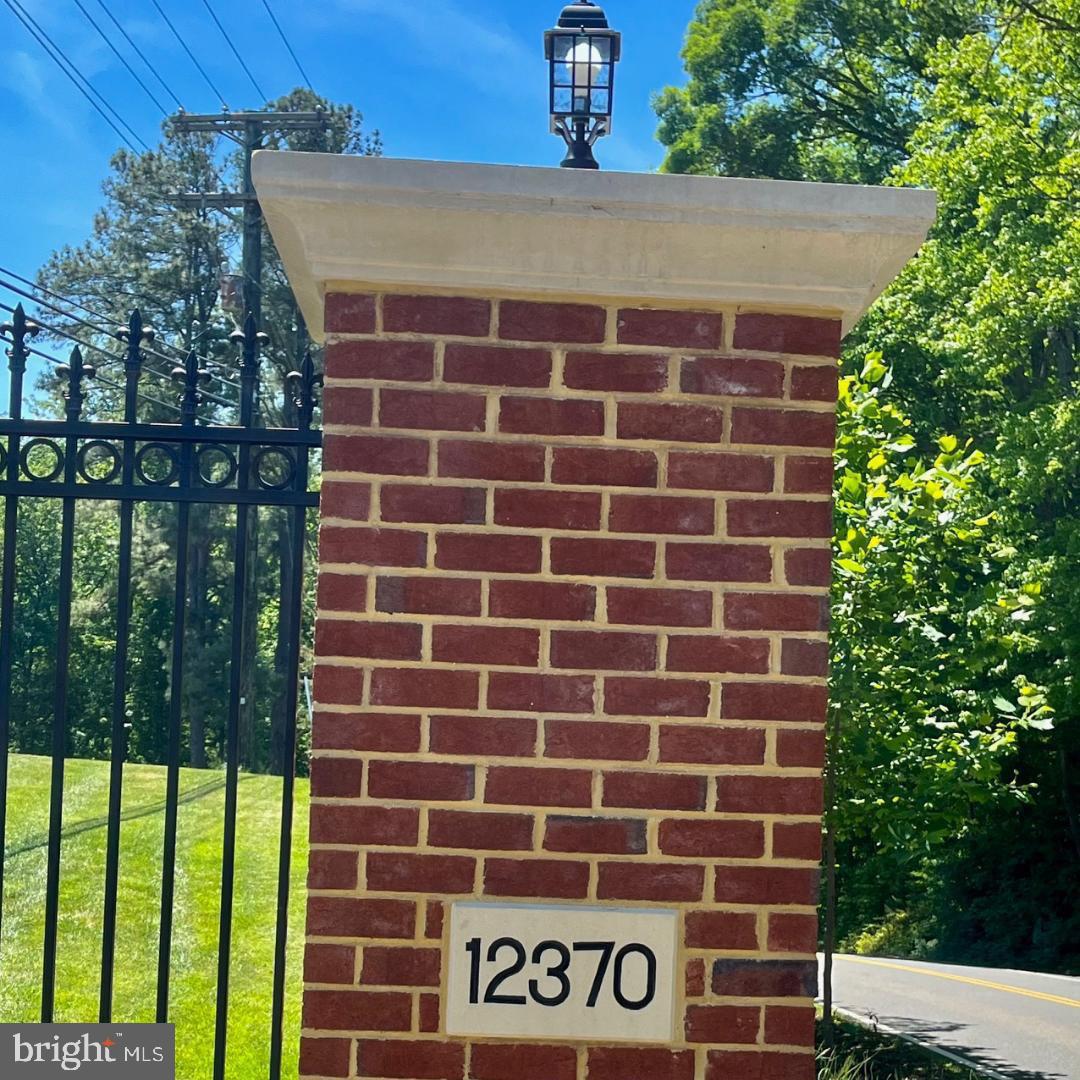 12370 Purcell Road Manassas, VA 20112 - Photo 5 of 30 Brick pillared road frontage w/ wrought iron
