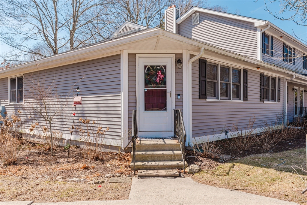 447 Stafford Road, Unit B1 Tiverton, RI 02878 - Photo 1 of 20 a front view of a house