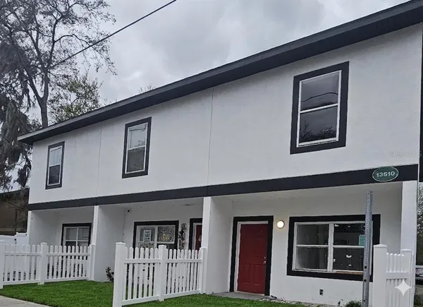 a front view of a house with windows